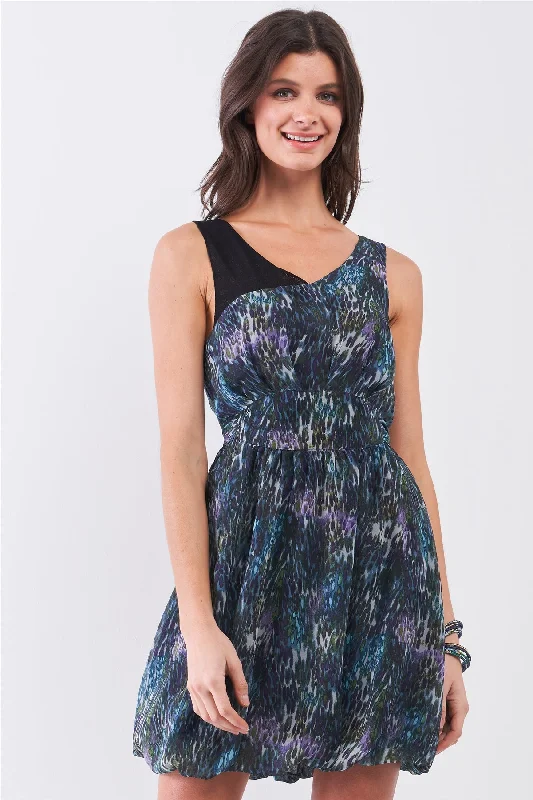 elegant and sophisticated Mimi dresses for a night out on the town.Navy Blue Sleeveless Mesh V-neck Self-tie Waist Stitched Together Bottom Mini Dress